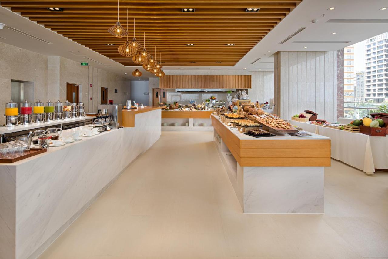 Tms Hotel Da Nang Beach Exterior photo The Club at Hong Kong International Airport